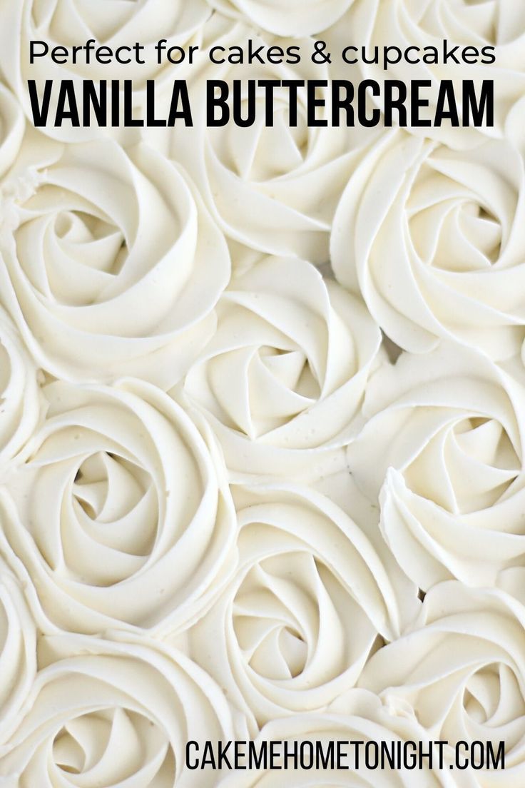 closeup of white icing roses on a cake