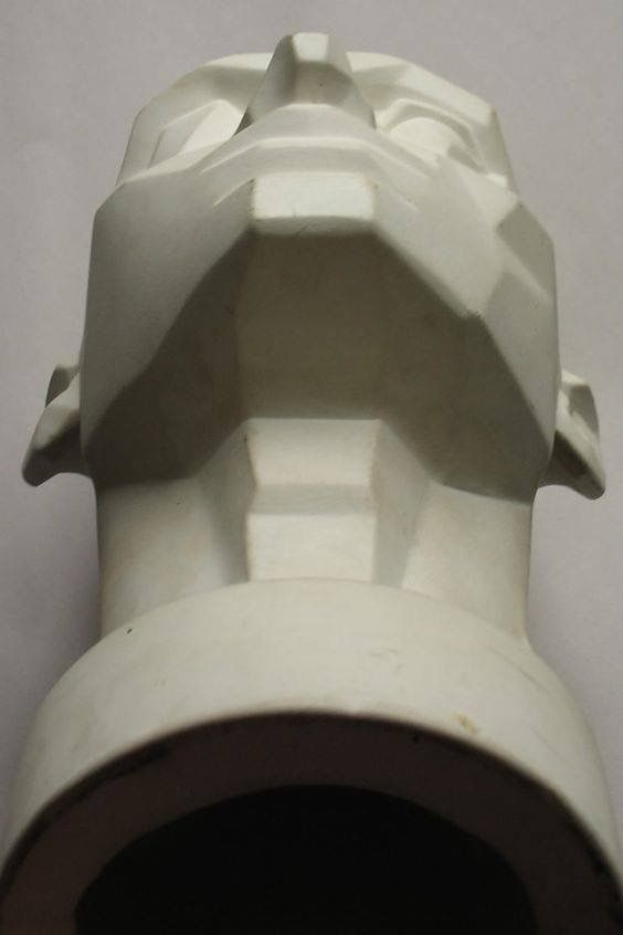 a close up view of a white ceramic object