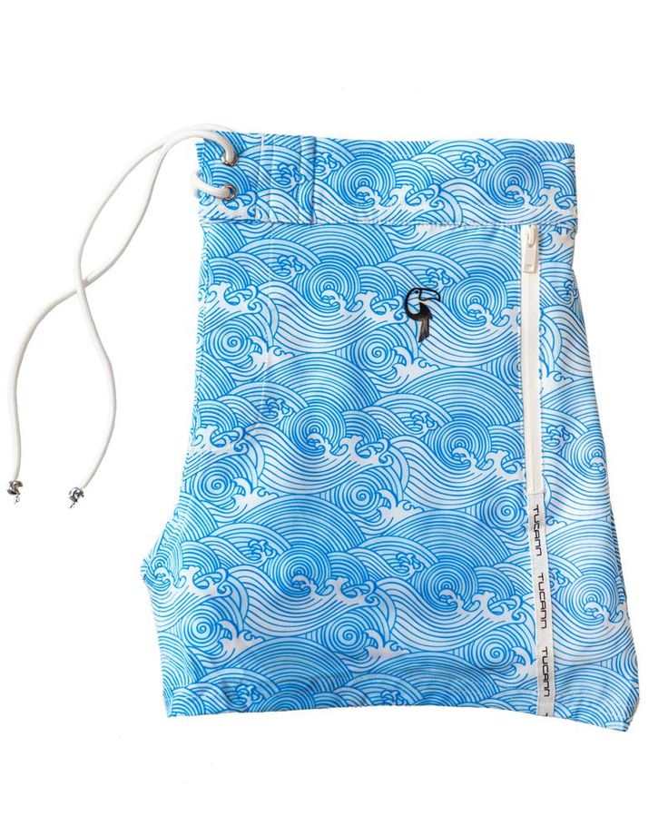 This modern and sleek design will make you the envy of other beachgoers – Make Waves Blue. Providing ultimate aesthetics and comfort, these swim trunks feature 4-way stretch, flexible fabric and a semi-elastic waistband. To elevate the premium feel of our blue swim trunks, we’ve placed luxe silver hardware to the drawstrings and a raised rubber Tucann logo. Look good and feel comfortable 24/7 with in-built underwear and quick drying capabilities. Think they look great? Wait till you try them on! Features 4 way stretch sublimated print material allows you full range of motion and minimal restriction In built swimming trunks means no more wet jocks! Made from premium swimming material/ Elasticized 1/2 waist at the back, tie at the front allowing for the perfect fitment and adjustment 2 x dus Summer Swimwear With Built-in Shorts And 4-way Stretch, Blue Swim Trunks With Built-in Shorts For Water Sports, Blue Bottoms For Water Sports During Beach Season, Blue Swimwear With Built-in Shorts For Surfing, 4-way Stretch Swimwear For Surfing During Beach Season, Nylon Swimwear With 4-way Stretch For Water Sports, Blue Athleisure Swimwear With Built-in Shorts, 4-way Stretch Bottoms For Poolside And Beach Season, Beach Season Nylon Swim Trunks For Poolside