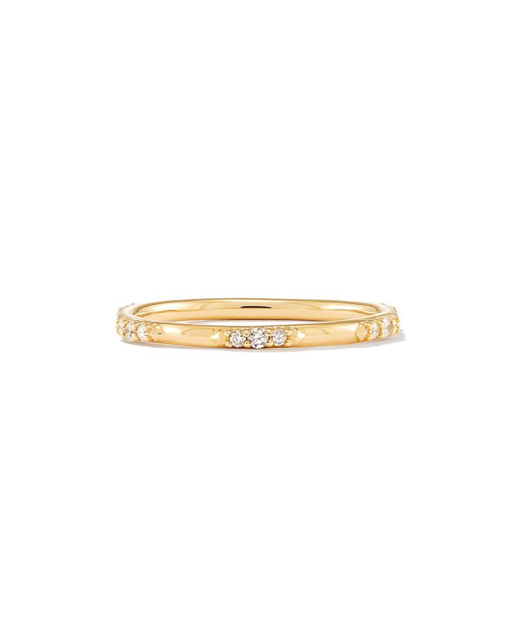 The Posey 14k Yellow Gold Band Ring in White Diamonds is a forever piece, whether intended to be a wedding band, anniversary gift, or ultimate wishlist spend. Crafted with a dusting of hand placed White Diamonds around a 14k Gold band, this heirloom ring is thoughtfully designed to last a lifetime. 

 We have taken steps to ensure that, when applicable, our diamonds are conflict free by requiring our suppliers to comply with the Kimberley Process. Timeless 14k Gold Eternity Band With Diamond Cut, Timeless 14k Gold Eternity Promise Ring, Yellow Gold Stackable Diamond Rings With Halo, Fine Jewelry 14k Gold Bands With Single Cut Diamonds, 14k Gold Bands With Single Cut Diamonds, Luxury Yellow Gold Stackable Half Eternity Rings, Timeless 14k Gold Stackable Rings With Halo Detail, Timeless Halo Stackable Rings In 14k Gold, 14k Gold Stackable Rings With Diamond Accents