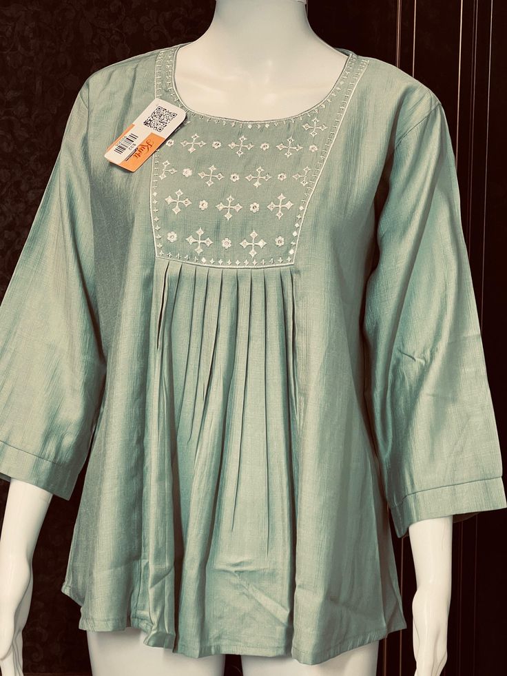 Short Kurtis Material: cotton silk Size 44/US LARGE Pista Green Spring Kurta With Cutdana, Spring Anarkali Cotton Silk Kurta, Anarkali Cotton Silk Kurta For Spring, Long Sleeve Kurta With Yoke For Eid, Eid Long Sleeve Kurta With Yoke Detail, Spring Anarkali Long Sleeve Blouse, Eid Kurta With Yoke Detail And Long Sleeves, Festive Anarkali Tops For Spring, Traditional Cotton Silk Tops For Eid