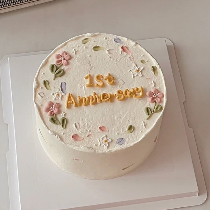 a white cake sitting on top of a table