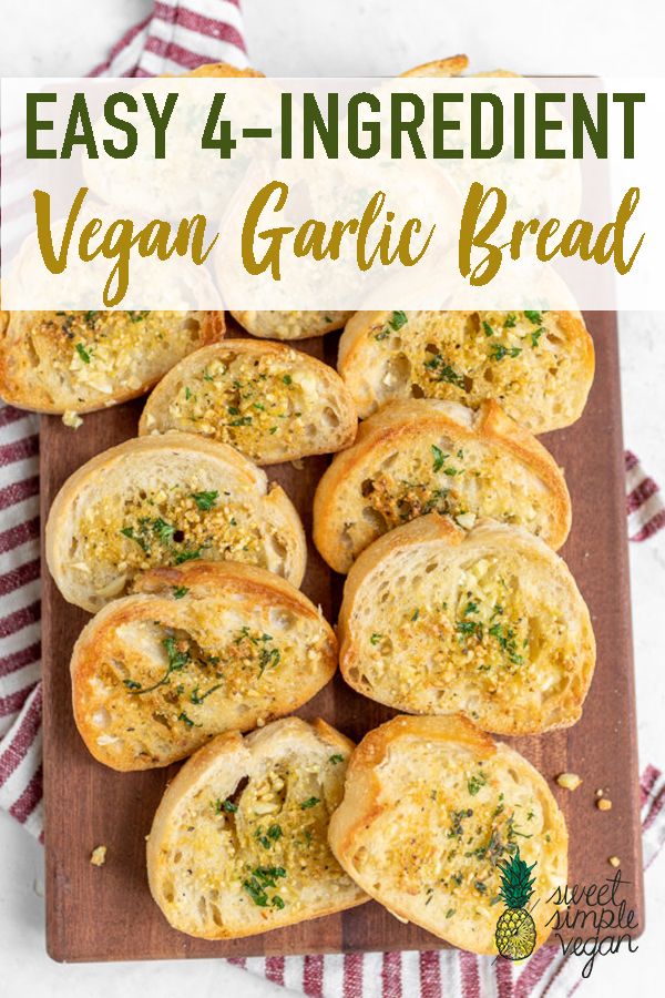 vegan garlic bread on a cutting board with text overlay