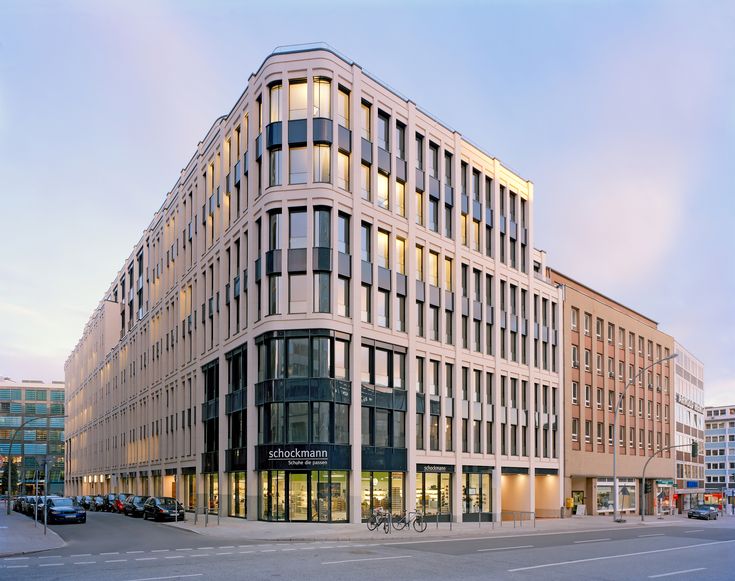 an office building on the corner of a street