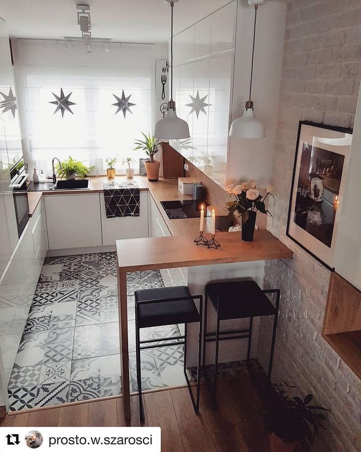 an instagram photo of a kitchen and dining area