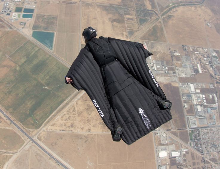 an aerial view of two parachutes in the sky