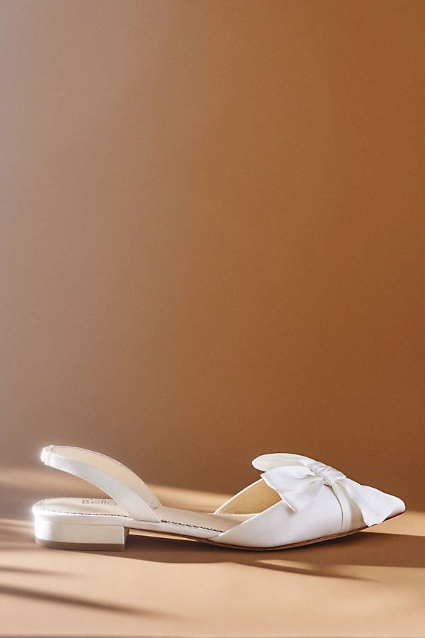 These slingback d'Orsay flats offer an oversized silk bow on each pointed toe and extra soft padding for a sophisticated look and all-day comfort. Flat Wedding Shoes, Feather Heels, Satin Ballet Flats, Invisible String, Designer Wedding Shoes, Single Pearl Necklace, Wedding Shoes Comfortable, Ivory Wedding Shoes, Bridal Flats