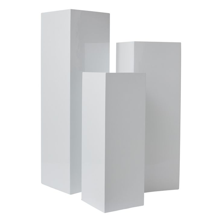 three white vases are stacked on top of each other in front of a white background