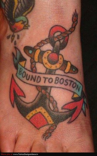 a foot tattoo with an anchor and ribbon around the bottom that says, found to boston