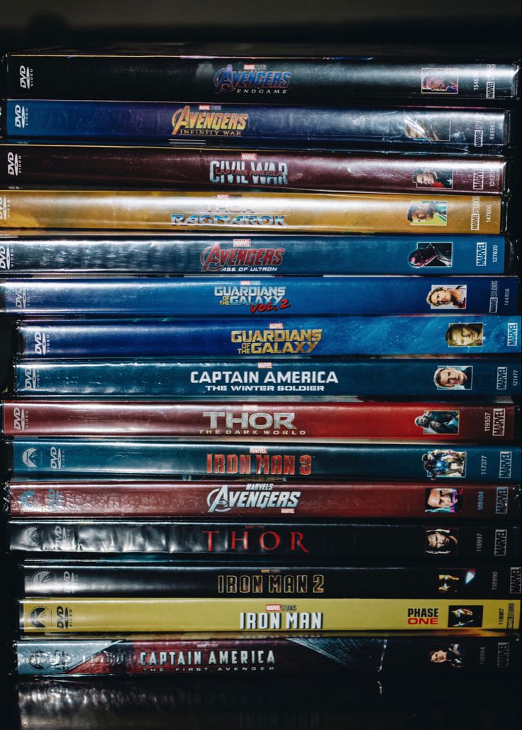 a stack of dvd's sitting on top of each other