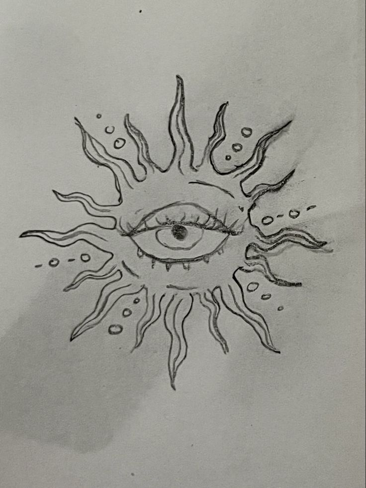 a drawing of an eye with sun rays coming out of it's irises