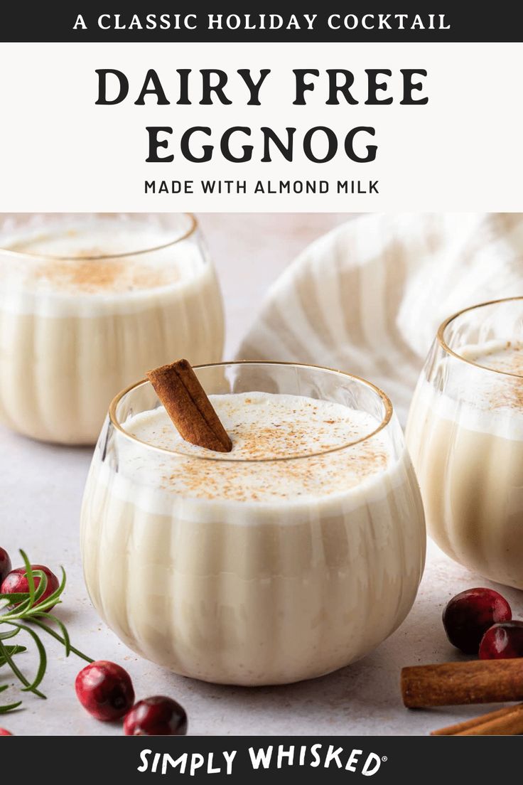 two glasses filled with eggnog on top of a table