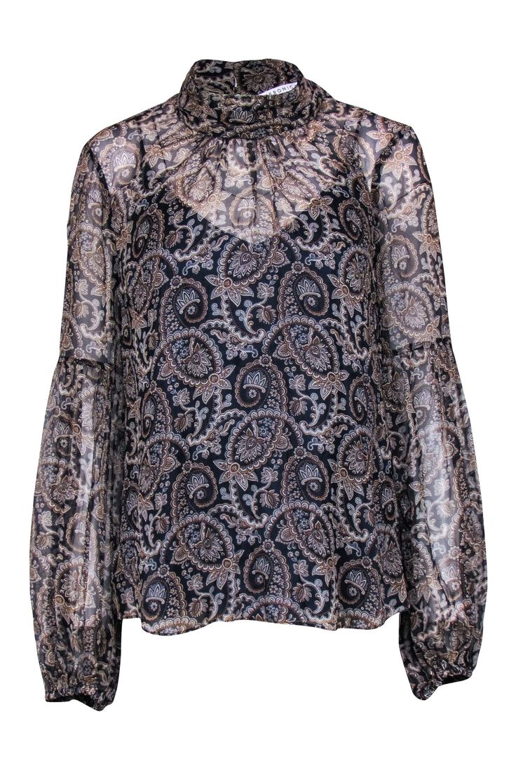 Bring some wow to your work wardrobe with this Veronica Beard paisley print top. The navy and brown pattern pops against the sheer fabric, so you'll be turning heads all day long! Look stylish and feel comfortable this fall at the office, with this top and a pair of brown pants. Size 14 Shell 100% Silk Lining 95% Polyester, 5% Spandex Button back neckline Mock neck Long sleeves Semi sheer Bust 46" Waist 46" Shoulder to hem 25" Sleeve length 27" Fitted Paisley Print Blouse For Work, Fall Paisley Print Tops For Work, Fitted Paisley Print Tops For Work, Fall Paisley Print Work Tops, Chic Paisley Print Top For Work, Chic Paisley Print Top For Workwear, Elegant Paisley Print Patterned Blouse, Elegant Paisley Print Blouse, Elegant Paisley Print Tops For Fall