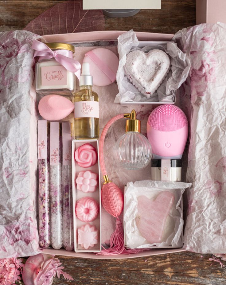 a pink box filled with lots of different items