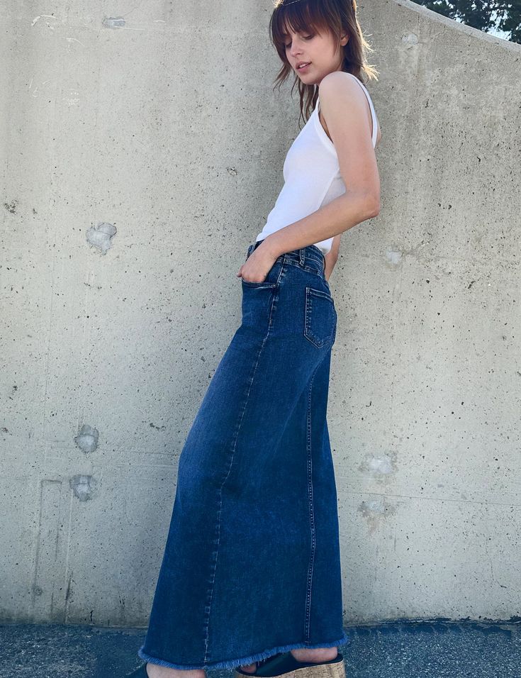 The Lowdown Denim Maxi Skirt from Wash Lab Denim - our signature premium denim with frayed hem, fits like it was made for you. That's the Lowdown! The model is 5'9" wearing size 26 Fabric: 96% Cotton 3% Polyester 1% Spandex Length: 37 3/4" from waistband Denim Maxi, Denim Maxi Skirt, Cover Model, Denim Midi Skirt, Premium Denim, Gravity, Maxi Skirt, Midi Skirt, Lab