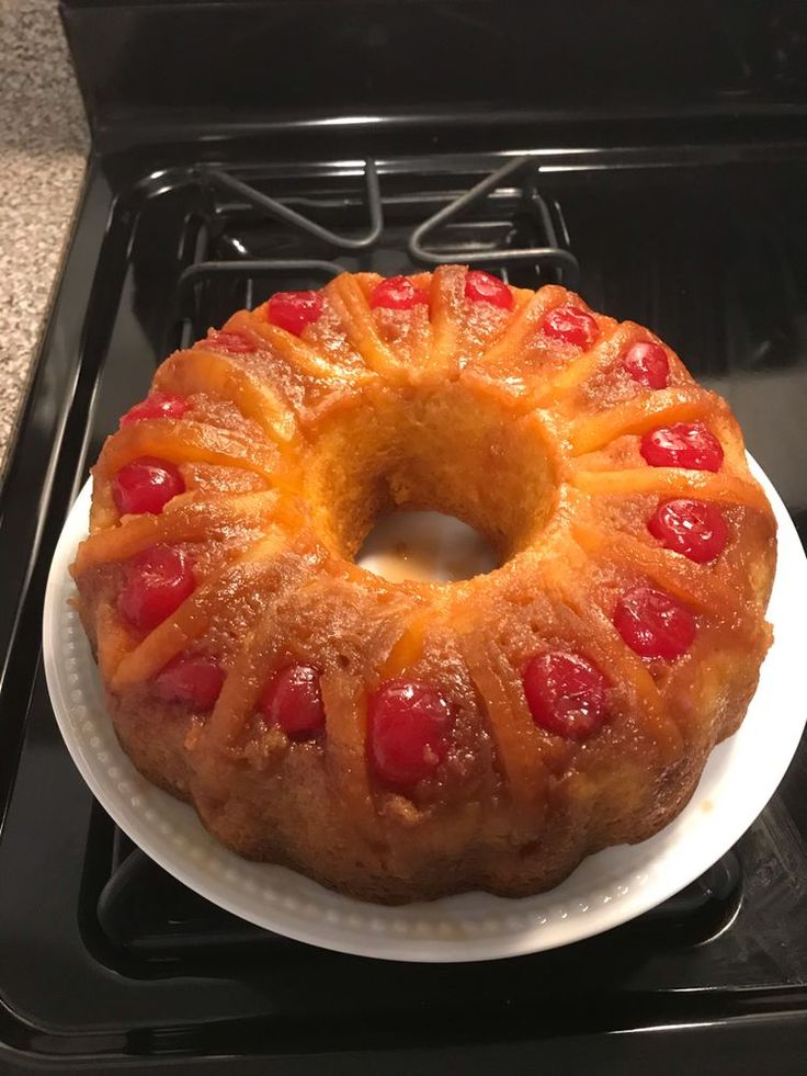 a pineapple upside down bundt cake on a plate