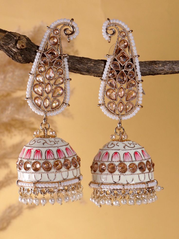 Experience the allure of timeless elegance with our exquisite pastel green Kundan polki jhumkas in ambi design . Done in meenakari work these hand painted  earrings exude a captivating charm, combining the lustre of gold with the intricate beauty of Kundan craftsmanship. Step into a world of grace and radiance with these stunning earrings. Embrace the enchantment they exude and let them become a reflection of your own elegance and sophistication. White Jewelry With Latkans For Eid, White Latkans Jewelry For Eid, White Cutdana Danglers For Festivals, White Cutdana Earrings For Festive Occasions, Festive White Cutdana Earrings, White Chandbali Earrings For Navratri, White Temple Jewelry Jhumkas With Cutdana, White Temple Jewelry Style Cutdana Jhumkas, White Temple Jewelry Chandbalis For Eid