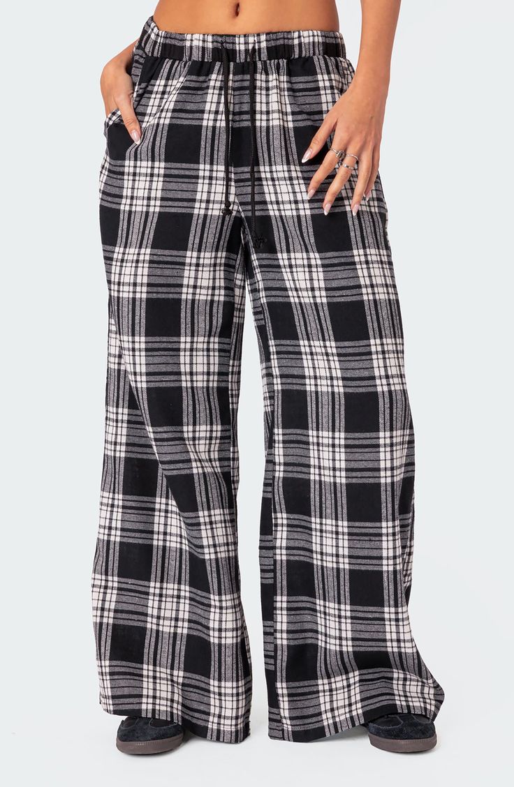 Lounging at home has never looked as good as it does in classic plaid pants cut in a breezy wide-leg silhouette with a comfortable drawstring waistband. Elastic/drawstring waist Front slant pockets 50% cotton, 50% polyester Machine wash, line dry Imported Fluffy Pj Pants, Pajama Pants Outfit, Pajama Pants Pattern, Plaid Wide Leg Pants, Black Pajama Pants, Plaid Pajama Pants, Flannel Pants, Cute Pants, Plaid Pajamas