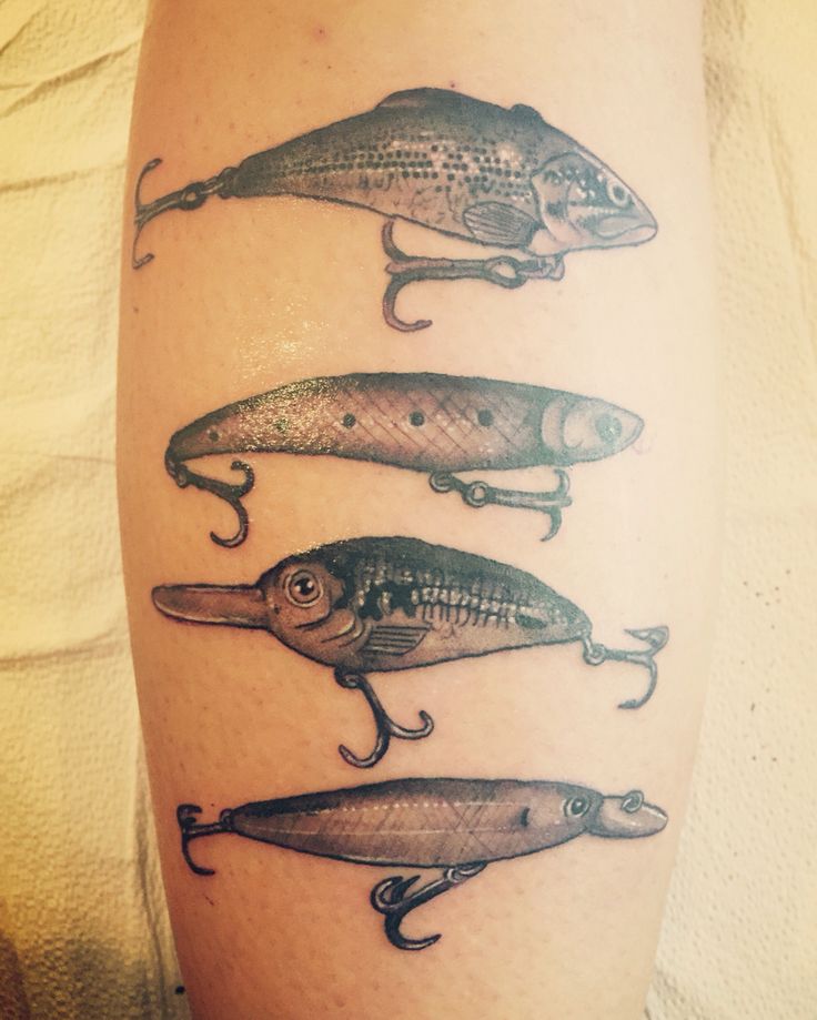 an arm with different types of fish on it