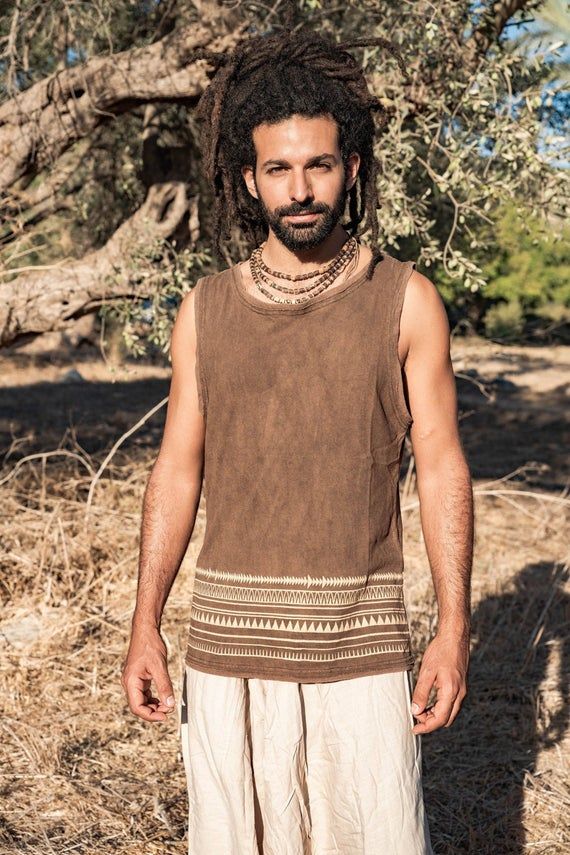 ❂ Walnut dyed brown hemp cotton tank top with tribal print . soft and earthy ❂⫸⫸ SIZE ⫸⫸S, M, L and XLPlease check the sizing chart in the last picture⫸⫸ MATERIALS ⫸⫸We focus on natural materials and aim to support traditional crafts and ancient skills ~striving to go deeper to the source of all materialsOur vision is to be able to connect with each being involved in the making from the very source,Being able to Source the most ethical, fair trade, Eco and conscious materials ⫸⫸ COLOR ⫸⫸❀ Please Brown Cotton Tank Top For Summer, Brown Cotton Summer Tank Top, Bohemian Brown Vest Top, Summer Brown Cotton Tank Top, Brown Sleeveless Hippie Top, Casual Cotton Tank Top For Festivals, Brown Casual Tank Top For Vacation, Casual Brown Tank Vest, Casual Brown Tank Top For Vacation