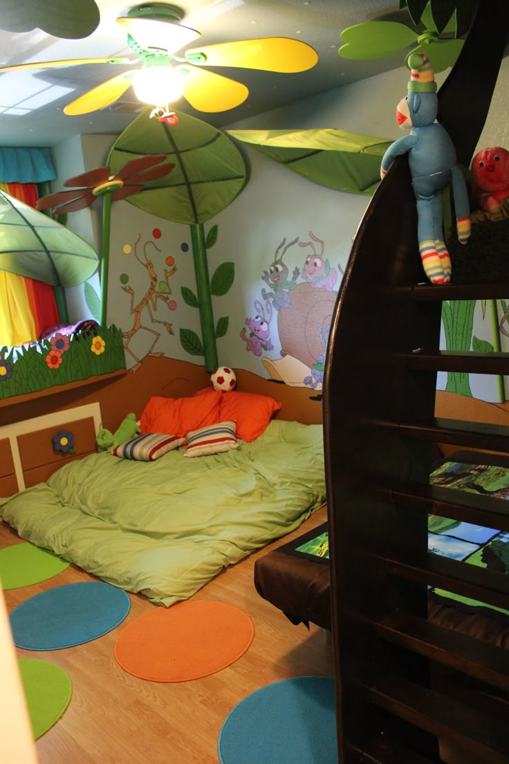 a child's bedroom decorated in green and orange