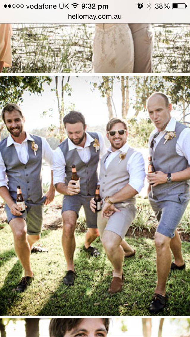 men in vests and ties are posing for pictures with beer bottles on their laps