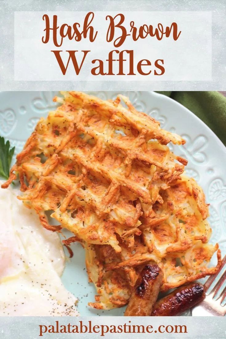 hash browns waffles on a plate with eggs