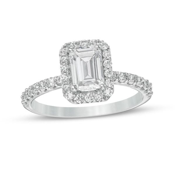 Set the stage for romance with this impressive engagement ring. Crafted in 14K white gold, this luxe look showcases a 1 ct. certified emerald-cut lab-created diamond - boasting a color rank of F and clarity of VS2 - wrapped in an octagonal frame of lab-created diamonds. Additional lab-created diamonds line the shank. Captivating with 1-1/2 cts. t.w. of lab-created diamonds and a bright polished shine, this engagement ring is destined to be admired. This style arrives with a certificate that incl Emerald Cut Diamond White Rings For Proposals, Lab Grown Diamond Ring With Halo Setting Emerald Cut, Dazzling Emerald Cut Halo Ring, White Emerald Cut Moissanite Halo Ring, Dazzling Emerald Cut Diamond Ring For Proposal, Dazzling Diamond Ring With Halo Setting, Emerald Cut, White Gold Emerald Cut Diamond Ring For Proposal, Emerald Cut Lab Grown Diamond Ring For Wedding, Timeless Emerald-cut Diamond Ring With Halo Setting