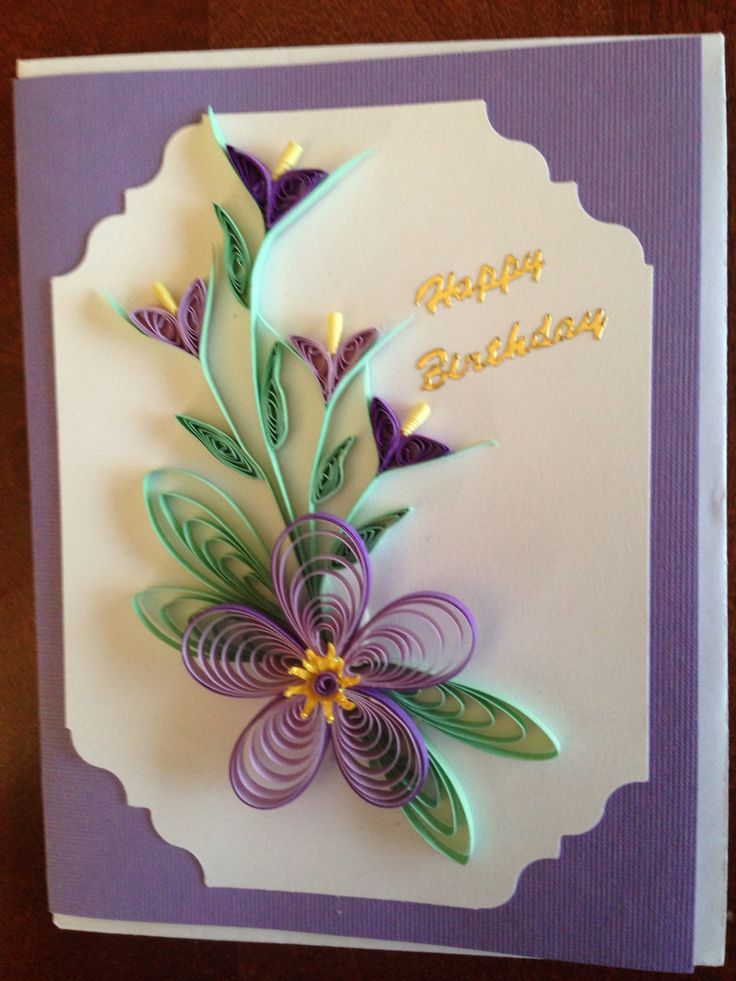 a purple and white birthday card with paper flowers on the front that says happy birthday