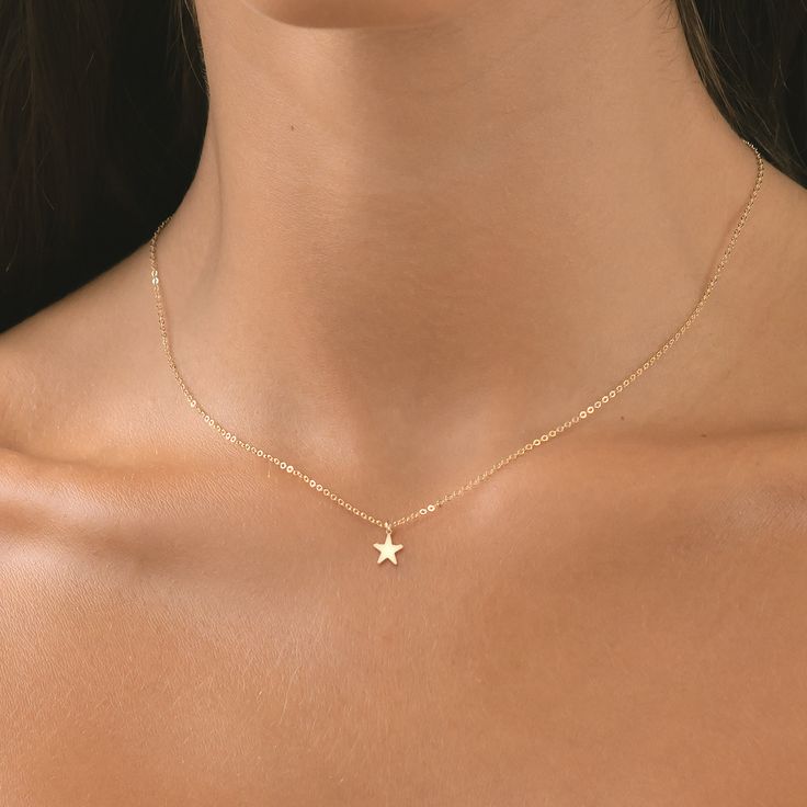 Indulge in celestial charm with our unique Tiny Star Necklace, available in your choice of luxurious 14k gold filled, classic sterling silver, or the romantic hue of 14k rose gold filled. This necklace is a dazzling expression of elegance, capturing the allure of the sky. ✨  Crafted with precision and attention to detail, this necklace is a perfect for everyday wear or special occasions. Their versatile design allows them to seamlessly transition from day to night, effortlessly complementing any Star Jewelry Silver, Minimalist Everyday Jewelry With Star Charm, Minimalist Star Shaped Tarnish Resistant Jewelry, 14k Gold-filled Star Charm Jewelry, 14k Gold-filled Yellow Gold Star Charm Jewelry, 14k Yellow Gold Filled Jewelry With Star Charm, 14k Gold-filled Yellow Gold Jewelry With Star Charm, Rose Gold Celestial Jewelry With Star Charm, Celestial Rose Gold Jewelry With Star Charm