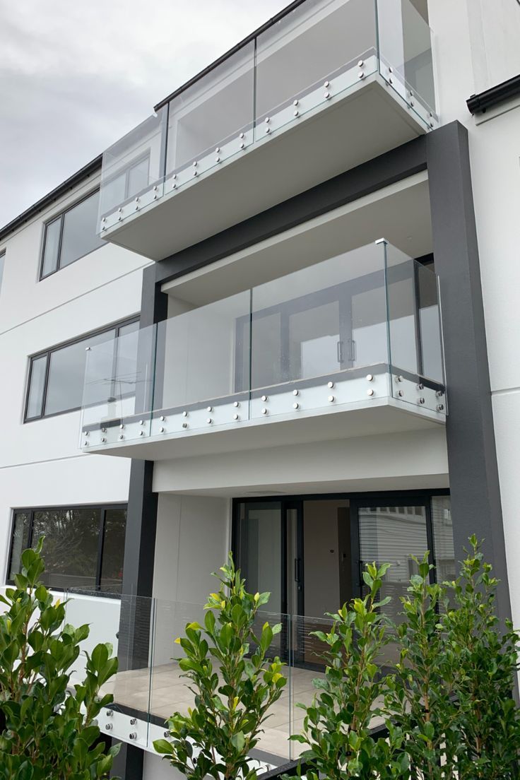 balcony with glass balustrades installed using double discs Frameless Glass Balustrade, Glass Balcony, Glass Balustrade, Pool Fence, Staircases, Auckland, Decks, Outdoor Space, Balcony