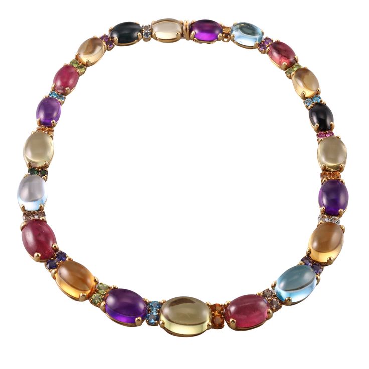 Italian made 18k gold necklace, set with multi color gemstone cabochons, including citrine, peridot, amethyst, tourmaline and topaz. DESIGNER: Not Signed MATERIAL: 18k Gold GEMSTONES: Tourmaline, Citrine, Topaz, Amethyst, Peridot DIMENSIONS: Necklace is 16.5" long and 15mm at the widest (center) point. MARKED/TESTED: 750, Italian mark. WEIGHT: 105.5 grams CONDITION: Previously Owned/Excellent Condition Luxury Multicolor Oval Gemstones, Fine Jewelry Multicolor Cabochon Gemstones, Multicolor Cabochon Gemstones For Fine Jewelry, Multicolor Cabochon Gemstones Fine Jewelry, Luxury Multicolor Necklace For Formal Occasions, Elegant Multicolor Cabochon Gemstones, Luxury Multicolor Necklaces For Formal Occasions, Luxury Multicolor Gemstones With Accents, Formal Multi-stone Oval Cabochon Gemstones