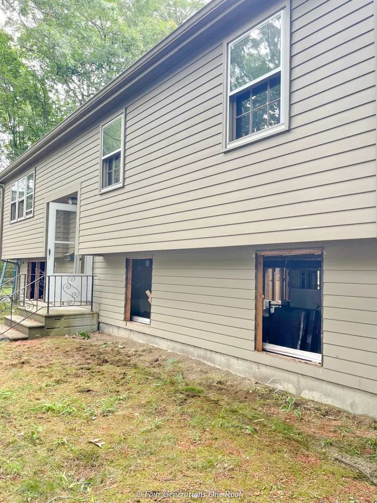 the back of a house that is being remodeled