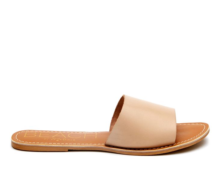 Available in Cowhair, Leather, Suede, or Tumbled Leather uppers, Slip on for easy entry, Flat heel, Open / Round toe shape, Padded footbed for added comfort, Synthetic man made outsole | Women's Beach by Matisse Cabana Sandals in Natural Size 6 Beachy Open Toe Sandals For Spring, Beach Season Open Toe Sandals, Beachy Open Toe Sandals For Beach Season, Beachy Open Toe Flip Flops For Poolside, Summer Sandals In Sand Color For Vacation, Summer Sand-colored Sandals For Vacation, Summer Sand Sandals For Vacation, Beachy Adjustable Open Toe Sandals, Beachy Sandals For Summer Outings