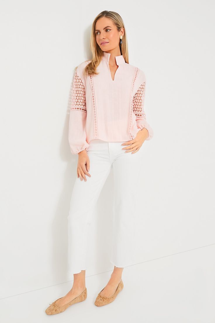 Extra cute thanks to the pale pink hue and eyelet detailing, the Jane Blouse will be playing on repeat in our closets this summer. With long blouson sleeves that feature delicately crafted cutouts and a relaxed, breezy fit that makes for effortless all day wear, you are sure to receive lots of compliments on this lightweight luxe style. A sweet way to dress up your most loved denim, from beach bonfires to al fresco spritzes with the gals, there's no wrong way to style this refreshingly chic top. Casual Airy Blouse For Spring, Spring Casual Blouse With Cutwork Hem, White Top With Cutwork Hem For Spring, Chic Summer Blouse With Cutwork Hem, Chic Spring Blouse With Blouson Sleeves, Casual Pink Top With Blouson Sleeves, Pink Blouse For Spring Daywear, Summer Long Sleeve Tops With Cutwork Hem, Feminine Lace Trim Blouse For Spring