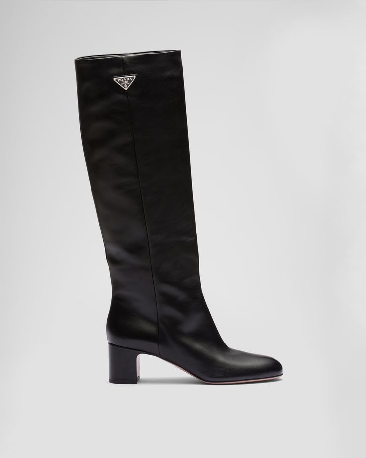 Black Leather boots | PRADA Luxury Calf Leather Knee-high Boots With Leather Lining, Designer Business Heeled Boots With Reinforced Heel, Luxury Knee-high Calf Leather Boots With Leather Lining, Designer Heeled Boots With Reinforced Heel For Business, Designer Calf Leather Knee-high Boots, Luxury Knee-high Calf Leather Boots With Leather Sole, Luxury Knee-high Boots With Leather Sole For Evening, Luxury Calf Leather Pointed Toe Heeled Boots, Luxury Calf Leather Heeled Boots With Pointed Toe