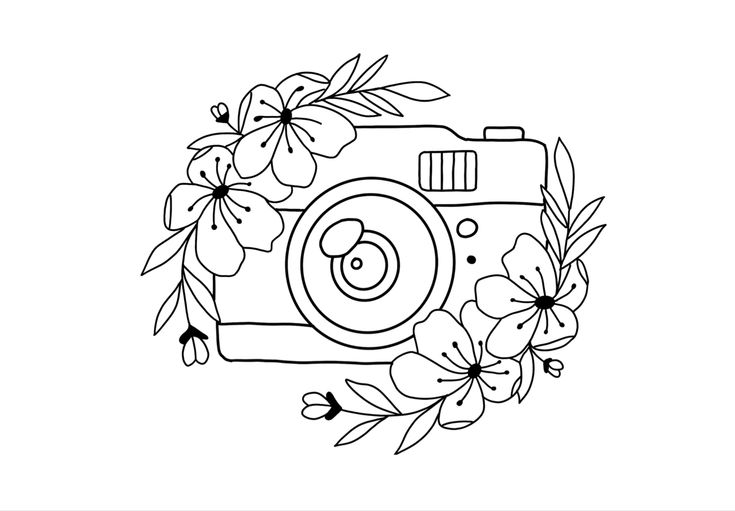 a camera with flowers and leaves around it