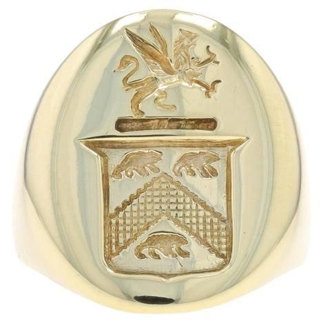 Size: 4 1/2 Sizing Fee: Up 3 sizes for $40 or Down 1 size for $40 Era: Vintage Metal Content: 14k Yellow Gold Style: Signet Theme: Coat of Arms, Family Crest Measurements Face Height (north to south): 23/32" (18.2mm) Rise Above Finger: 3/32" (1.7mm) Weight: 9.6 Grams Stamps: 1 4, S maker's mark Condition: Pre-Owned Professionally cleaned, polished, and tested to guarantee metal content. La Face, Family Crest, Vintage Coat, Coat Of Arms, Signet Ring, Gold Style, Makers Mark, Vintage Metal, Metallica