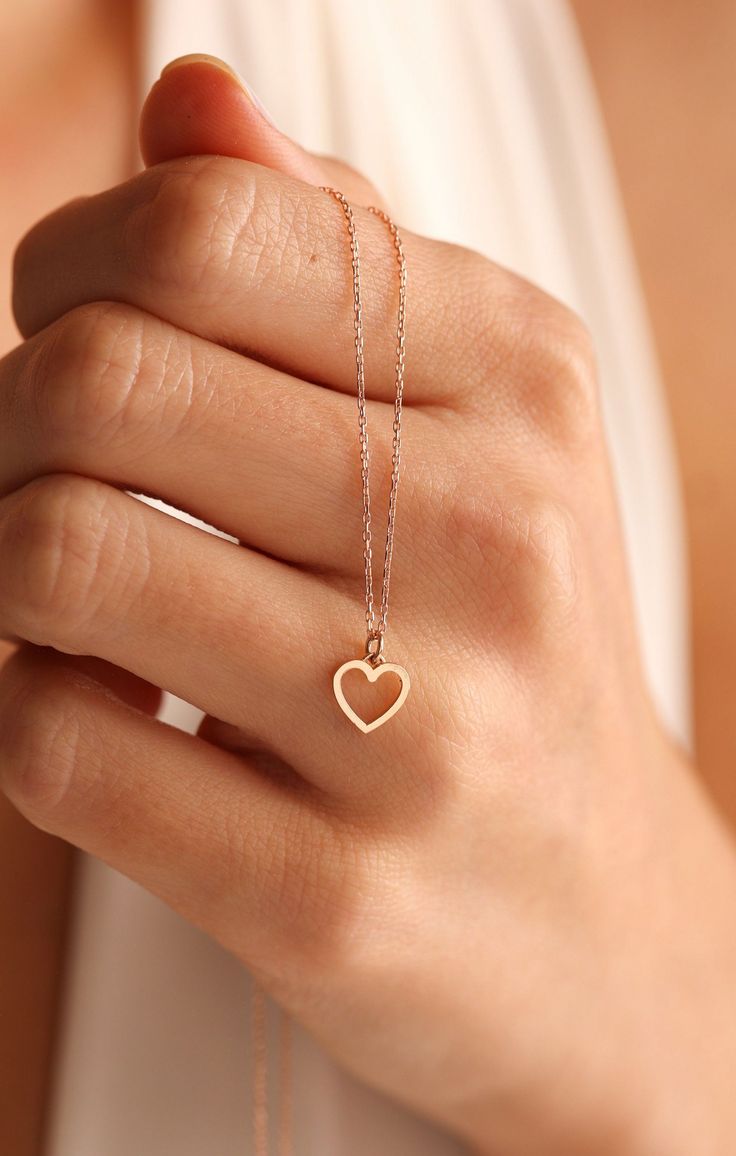 🔶 Minimalist Solid Gold Necklace is a unique Gift For Her which represent your love with its heart design. 🔶 Dainty Necklaces can be matched with almost every clothing with its simple and elegant design. 🔶 Handmade Gold Jewelry Women can be used both in special days and as a Everyday Necklace too! 🔶 14k Gold Jewelry is a good choice to make a lady happy. 🔶 Gold Carat: 14...#Jewelry #of #Accessories #Minimalist #Elegance #and #Simplicity #Beauty #Exploring #Gemstone #the #Style #Embracing Simple Accessories Minimalist, Pendant Gold Design, Gold Simple Necklace, Everyday Necklace Simple, Gold Jewelry Women, Simple Necklace Designs, Simple Gold Necklace, Jewelry Necklace Simple, Gold Minimalist Jewelry