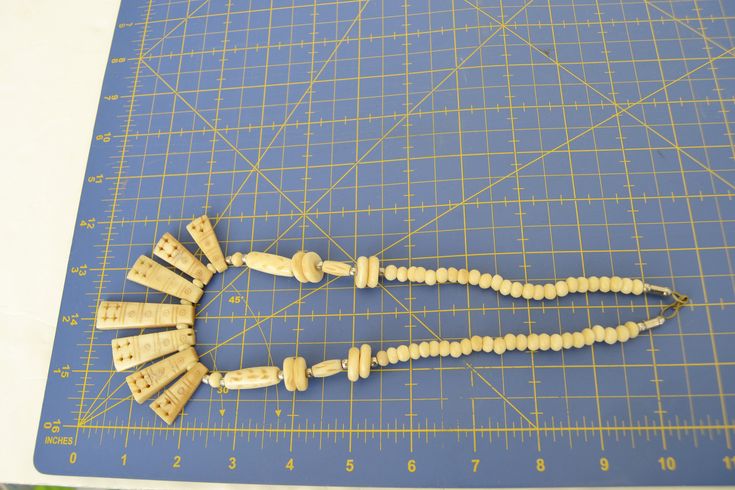 Tribal bone necklace tribal boho vintage necklace bone necklace Unique Adjustable Bone-colored Necklace, White Bohemian Jewelry With Wooden Beads, Bohemian White Jewelry With Wooden Beads, Unique Adjustable Bone Colored Necklace, Unique Adjustable Bone Necklace, Adjustable Vintage Beige Necklace, Vintage Adjustable Beige Necklace, Vintage Beige Adjustable Necklace, Handmade Bone-colored Unique Necklace