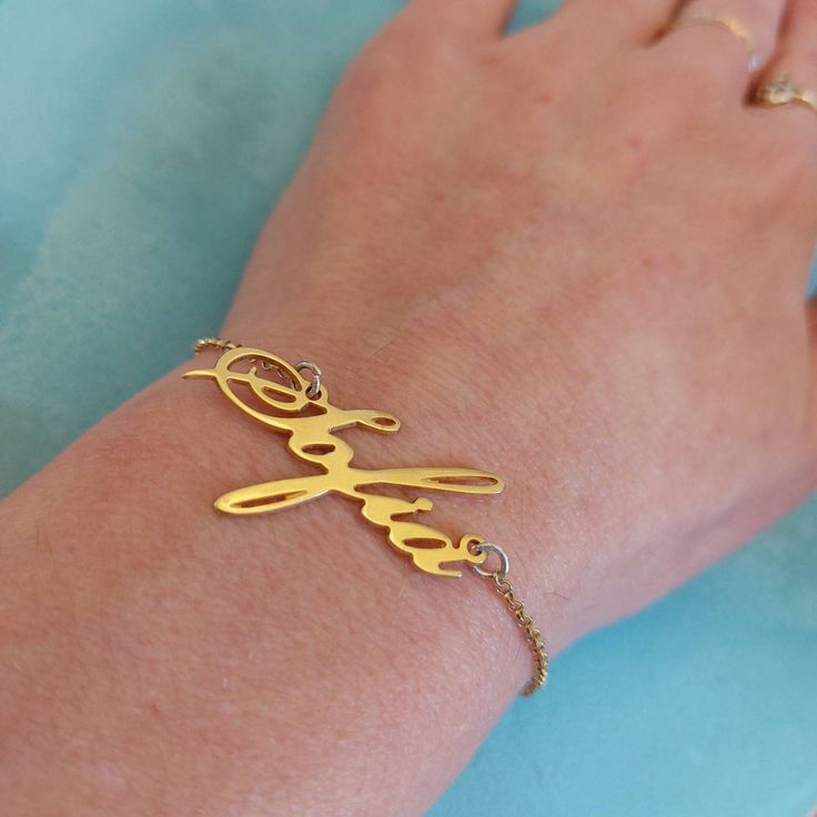 14k Yellow Gold - Name Bracelet - Dainty Gold Bracelet - Personalized Jewelry - Cursive Name - Custom Name Bracelet - Customized Gift -Sofia . . . . . . . . . . . . . . . . . . . . . . . . . . . . . . . . . . . . . . . . . . . . . . . . . . . . . . . . . . . Looking for a thoughtful gift for your loved one? You will love this high quality personalized 14k yellow gold cursive name bracelet. This is a perfect gift for your girlfriend or wife. Personalize it with her name in a beautiful font. This Gold Name Bracelet, Ankh Necklace, Sunshine Necklace, Dainty Gold Bracelet, Celestial Necklace, Family Necklace, Gold Name Necklace, Bracelet Dainty, Gold Sun