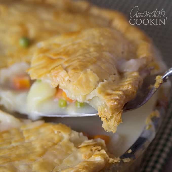 a piece of chicken pot pie on a spoon