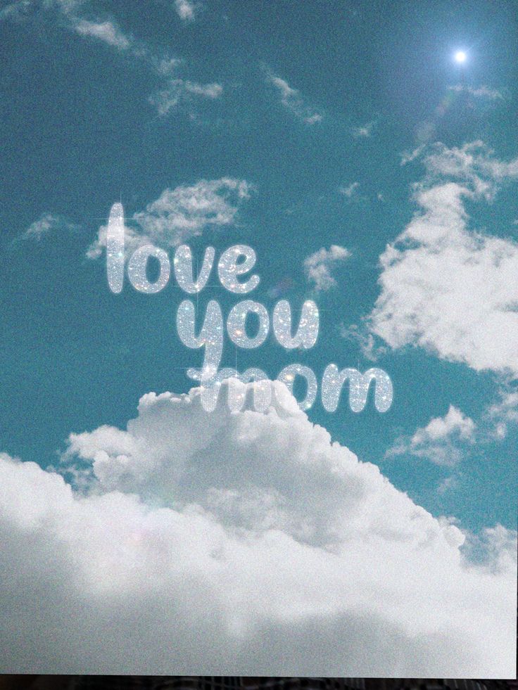 the words i love you mom written in white on a blue sky with fluffy clouds