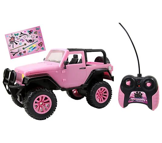 a pink toy truck with a game controller