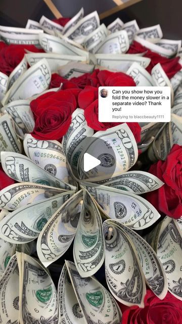 roses and money are arranged in the shape of a flower