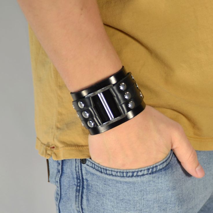 * Solid leather bracelet 
 * Adjustable
 * Gift bag included Black Leather Cuff Bracelet, Feel Powerful, Black Leather Bracelet, Leather Cuff Bracelet, Wide Bracelet, Jewelry For Men, Leather Cuffs Bracelet, Metal Accents, Unique Bracelets