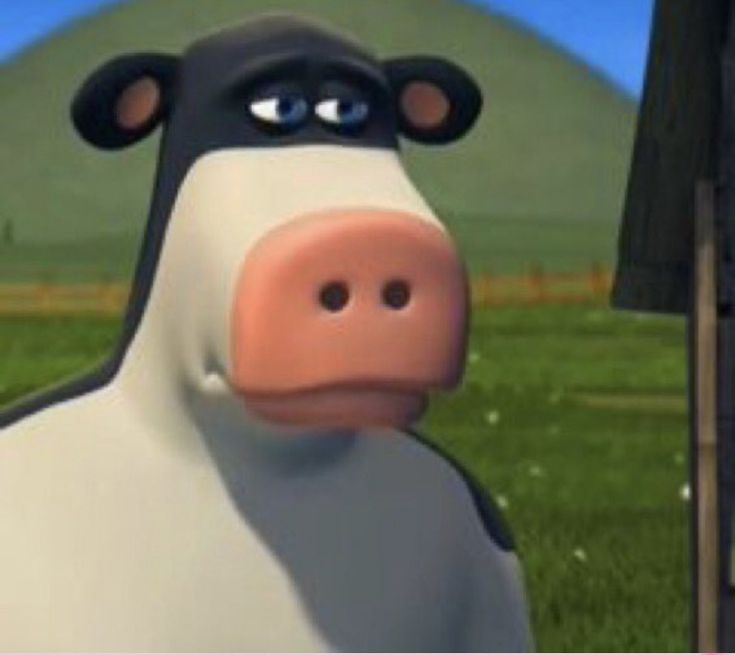 a cartoon cow is standing in the grass