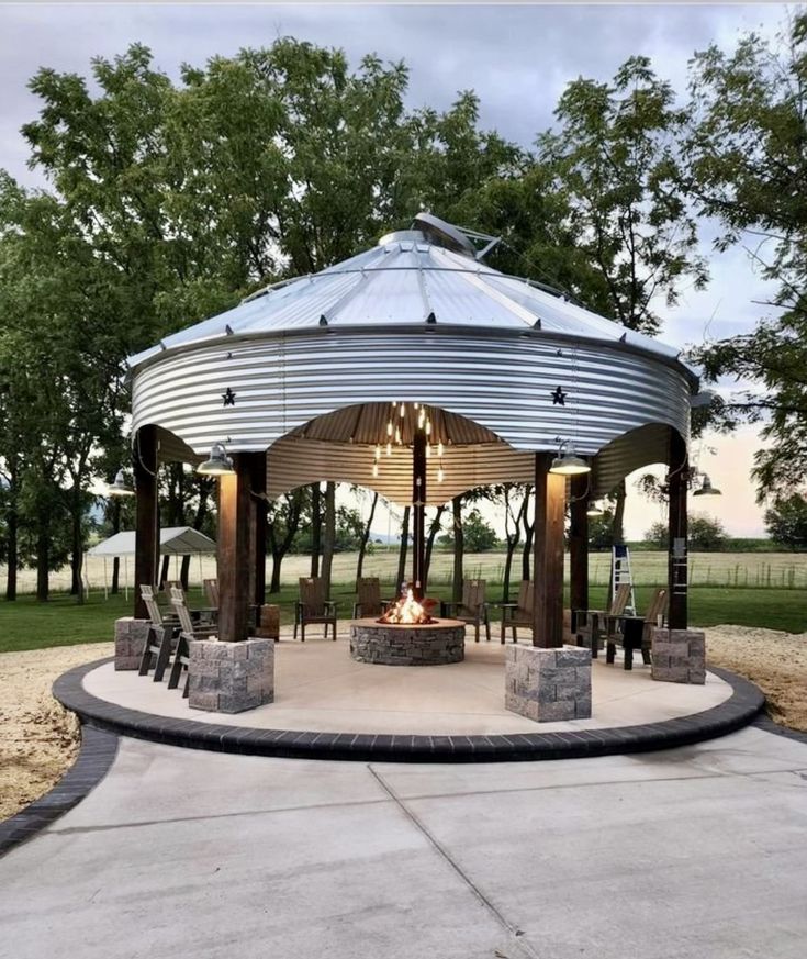 a gazebo sitting on top of a cement field