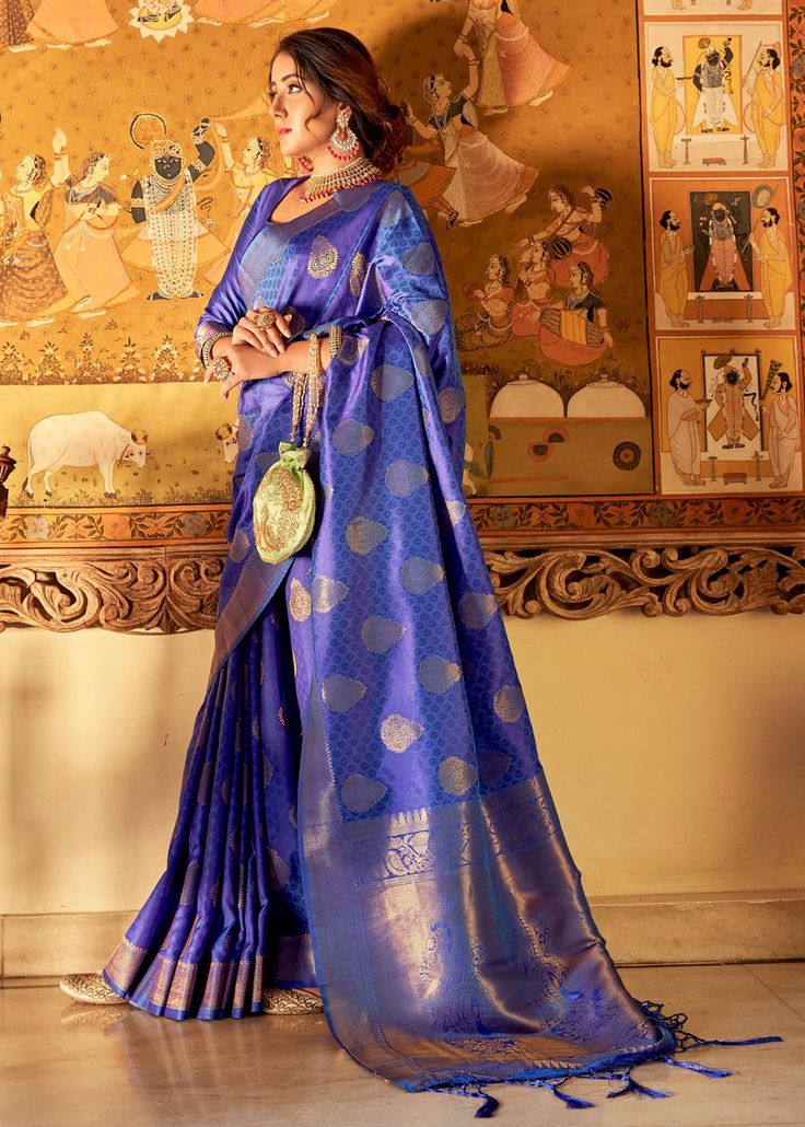 ROYAL STRIKING BLUE WOVEN KANJIVARAM SILK 105  Desc:      Intricate timeless design on this grand saree is perfect for a grand occasion this Kanjivaram saree will easily attract eyes. With exquisite design spread across the length of the saree it is perfect for any occasion. This saree has a white tone with a slight blend of gold colour. It has been the best seller till date!Saree length : 5.5 meterBlouse piece :  0.8 meterFabric : Blended silk and Zari. With Express Free Shipping and Custom Sti Elegant Blue Pre-draped Saree For Puja, Bollywood Style Blue Pre-draped Saree, Traditional Blue Pre-draped Saree With Self Design, Blue Bollywood Banarasi Silk Pre-draped Saree, Elegant Blue Pre-draped Saree With Zari Weaving, Blue Art Silk Pre-draped Saree With Traditional Patterns, Semi-stitched Royal Blue Saree, Traditional Blue Pre-draped Saree For Festivals, Blue Wedding Pre-draped Saree With Zari Weaving