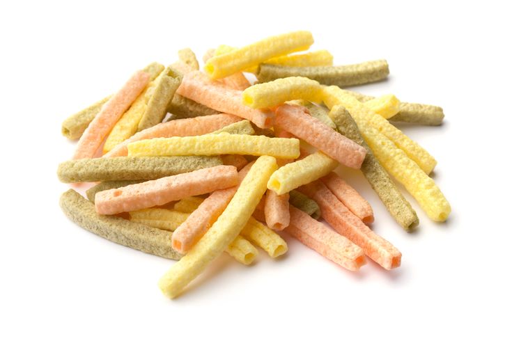 small pile of french fries sitting on top of a white table